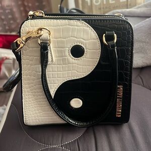 Poppy Lissiman ying yang purse